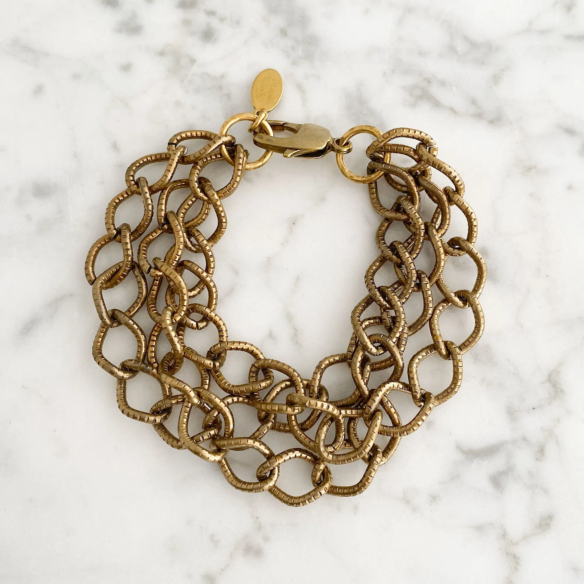 CAGNEY brass multi chain bracelet