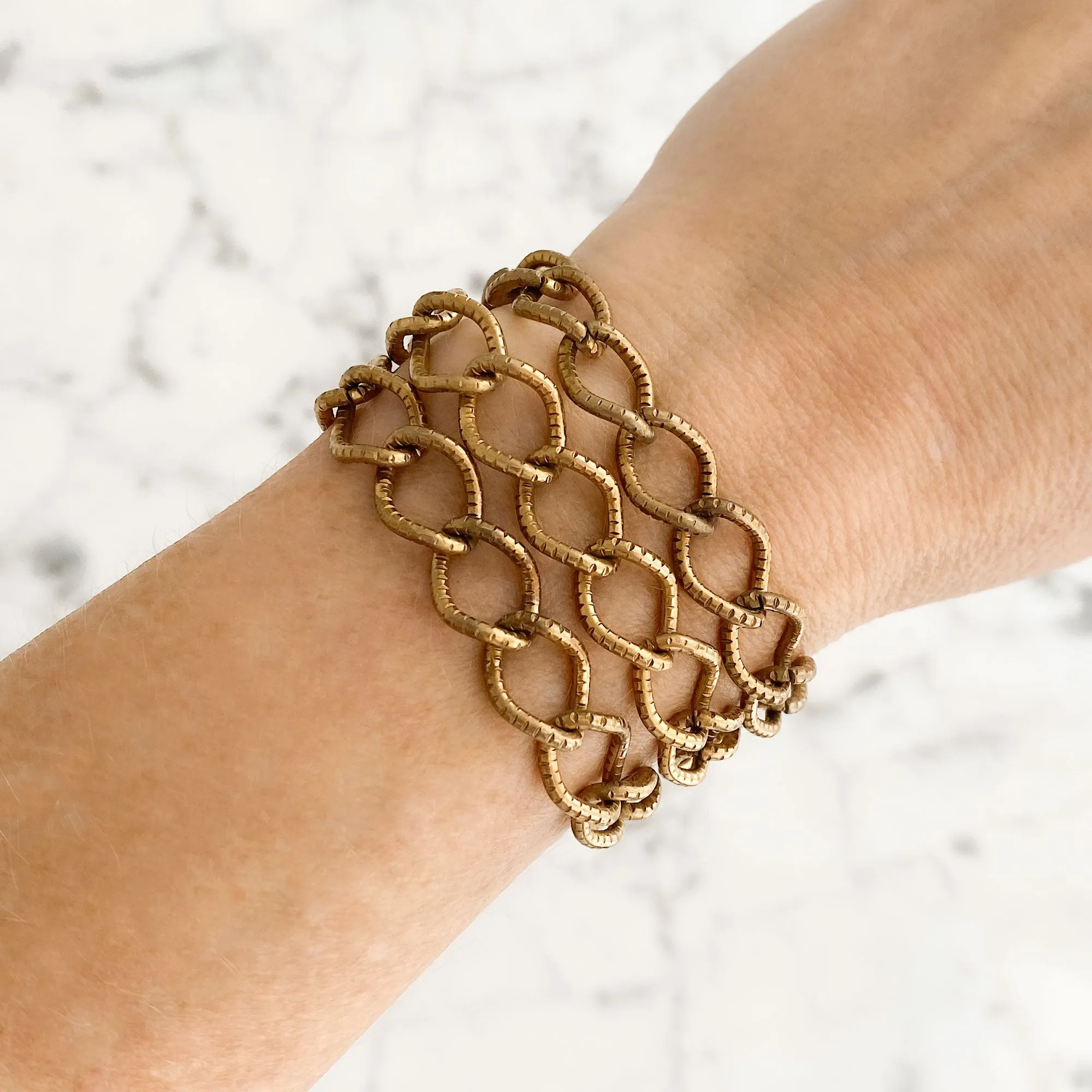 CAGNEY brass multi chain bracelet