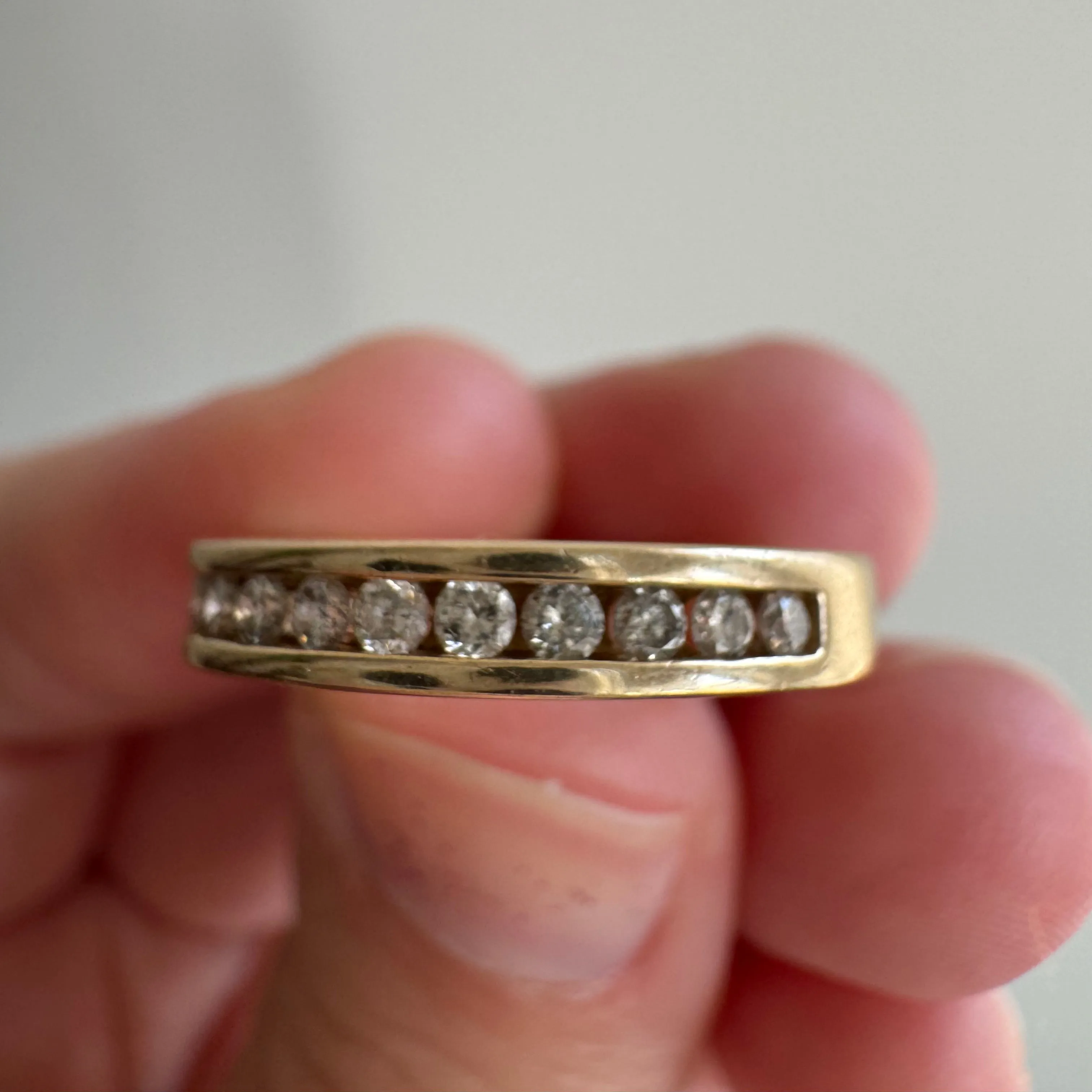 V I N T A G E // hidden LOVE / 10k yellow gold and channel set diamond half eternity band / size 5