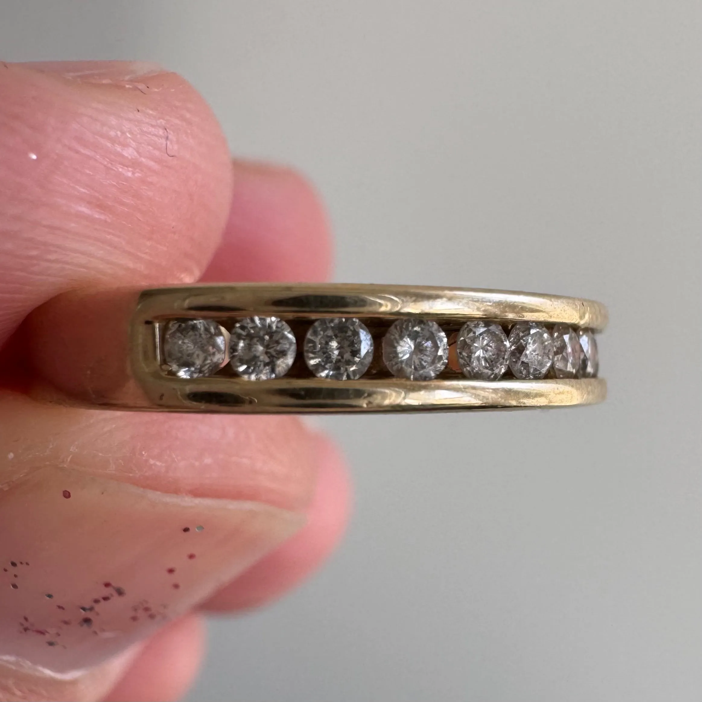 V I N T A G E // hidden LOVE / 10k yellow gold and channel set diamond half eternity band / size 5